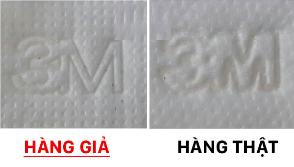 Trên khẩu trang 3M thật, chữ in rất sắc nét còn trên khẩu trang giả các nét in lem luốc, gần như không thể đọc được. Ảnh: Quantrimang.
