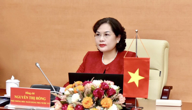 Sáng 12/11, bà Nguyễn Thị Hồng trở thành nữ Thống đốc Ngân hàng đầu tiên tại Việt Nam. Từ năm 1951 đến nay, ngành ngân hàng đã có 14 Thống đốc, nhưng đều là nam giới. Ảnh: Vietnamnet.