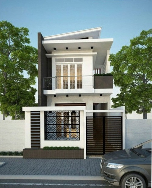 Nhà ống 2 tầng xây lệch về 1 bên để nhường diện tích cho lối đi lại, đồng thời tạo điều kiện để nhà mở thêm được mặt thoáng. Ảnh: Noithat9X.