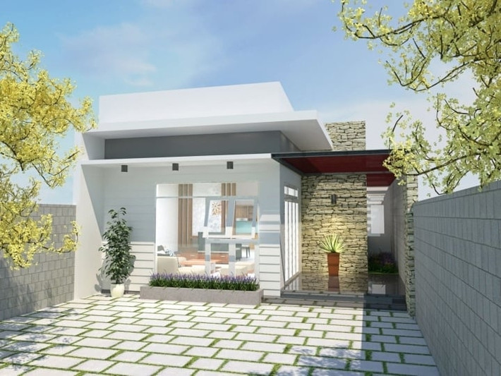 Phần trước ngôi nhà được xây thành từng trụ lớn ốp đá vân nổi bật. Ở phần mái thiết kế thêm một không gian gác xép, có cửa sổ. Ảnh: Internet