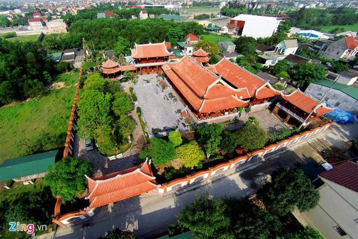 Căn nhà gỗ của ông Lê Đình Cường được ví như biệt phủ ở xóm 3, xã Nghi Phú (TP. Vinh, Nghệ An). Ảnh: Zing.