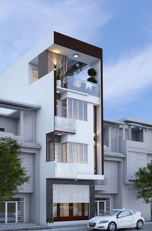 Nhà ống 4 tầng lệch kiểu hiện đại trẻ trung và thoáng đãng. Ảnh: Song Phát Construction.