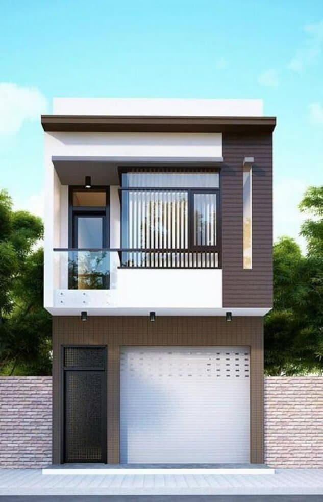 Ngôi nhà mái bằng đơn giản, màu sắc hài hòa, có gara để xe. Ảnh: Ddsdehouse.