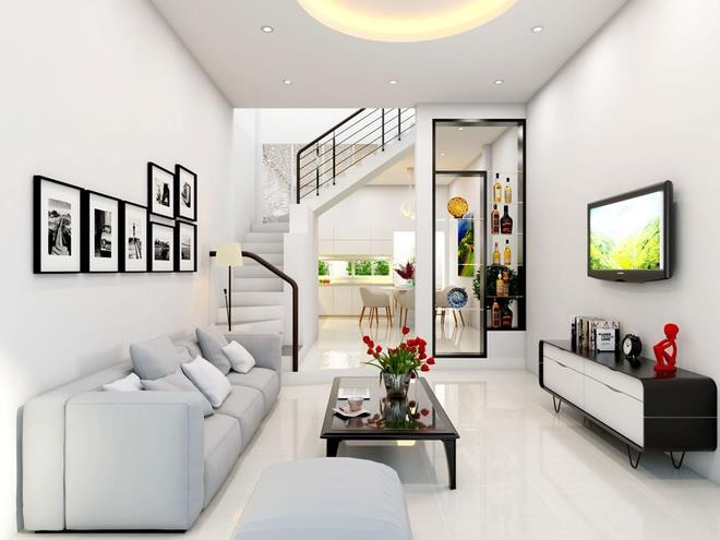Với đặc điểm không gian nhỏ, hẹp, phòng khách nhà ống cần có sự bài trí đơn giản để tránh mang lại cảm giác chật chội. Ảnh: Noithattrevietnam.