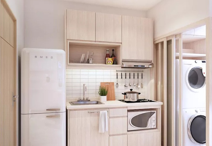Mặc dù hơi chật hẹp nhưng căn bếp sau vẫn đầy đủ các đồ dùng cần thiết như bếp ga, lò nướng, máy hút khói...Ảnh: Homify.