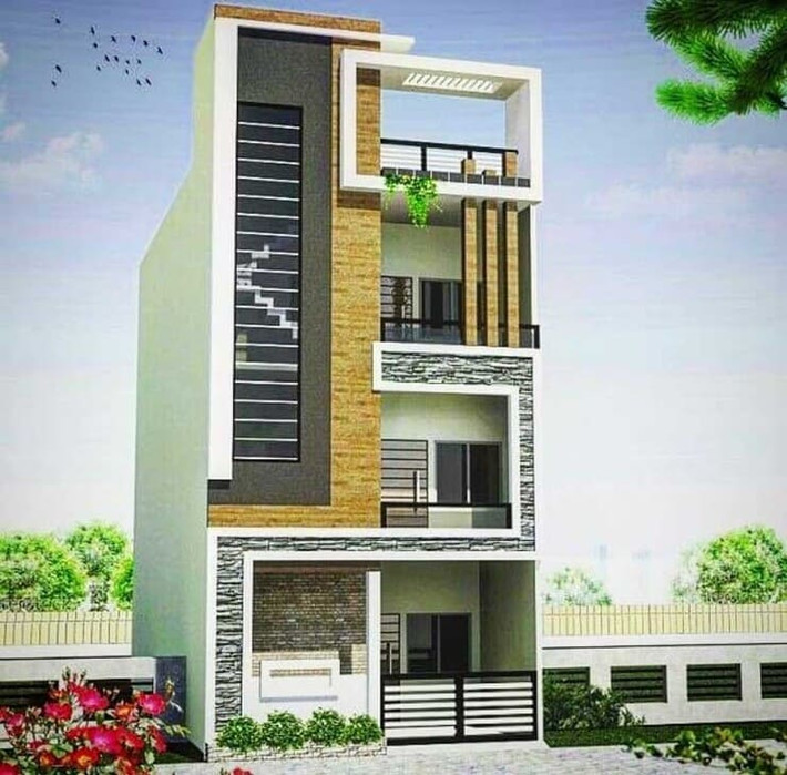 Thiết kế nhà phố kiểu vuông vức lệch tầng với điểm nhấn là mặt tiền ốp đá. Ảnh: Xaydungcuonggiahieu