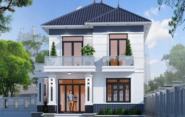 Nhà mái Nhật 2 tầng đơn giản là lựa chọn phù hợp với gia chủ yêu thích sự thanh lịch, nhẹ nhàng. Ngôi nhà thiết kế gọn gàng, tối ưu không gian sống hiệu quả. Ảnh: Igcons