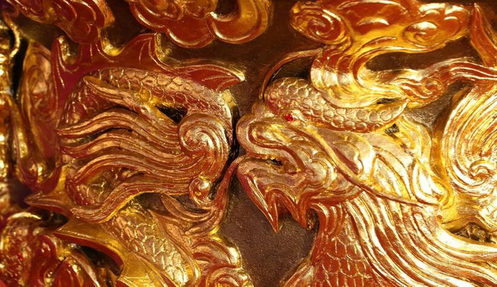 Hình tượng 9 con rồng được dát vàng, tương đương khoảng 5 lượng vàng 24K. Ảnh: ĐSPL