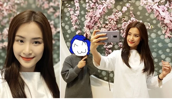 Trong các sao showbiz Việt, có lẽ Đông Nhi là người có nhiều bức ảnh tự sướng đẹp nhất. Nhưng để có bức ảnh sống ảo của mình, cô nàng này cũng phải nhờ đến fan đứng cầm cành anh đào để lấy phông nền mộng mơ.