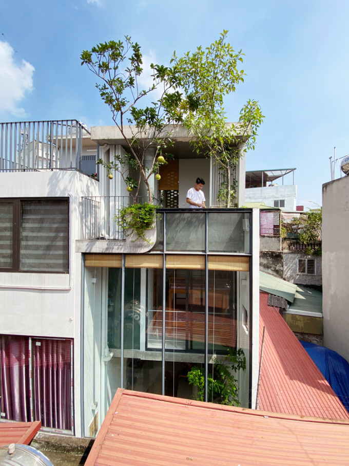 Một trong 2 công trình Việt lọt danh sách 50 nhà của năm 2021 là ngôi nhà mang tên TH House do văn phòng ODDO architects thiết kế.