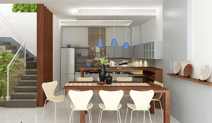 Tủ bếp và bàn ăn được xếp theo chiều ngang nhưng không hề khiến căn bếp chật chội.