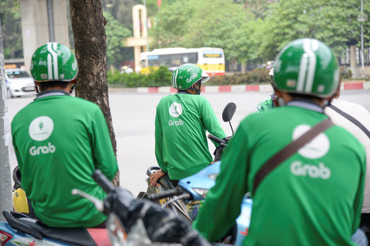 Thông tin này khiến nhiều người đã nghĩ đến sự độc quyền của Grab tại Đông Nam Á. Tuy nhiên, trên thực tế, sau khi "tóm gọn" Uber, Grab vẫn phải cạnh tranh với một đối thủ tại Indonesia là Go-Jek. Ảnh: NLĐ.