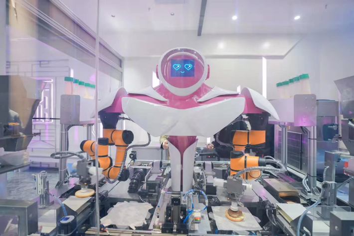 Khách hàng thậm chí có thể được phục vụ một bữa ăn nấu bằng robot nhanh nhất chỉ trong vòng 20 giây sau khi đặt món. Ảnh: SCMP