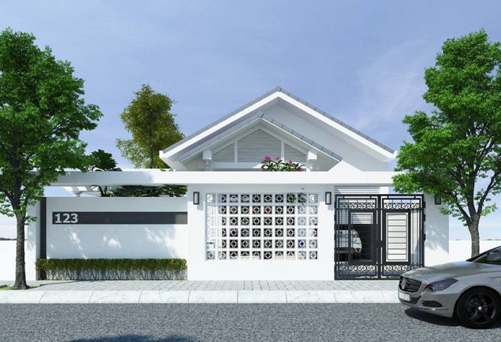 Mẫu nhà cấp 4 có gara ô tô, sử dụng gạch bông gió trang trí được ưa chuộng ở các vùng ngoại ô. Ảnh: Nhadepsang.