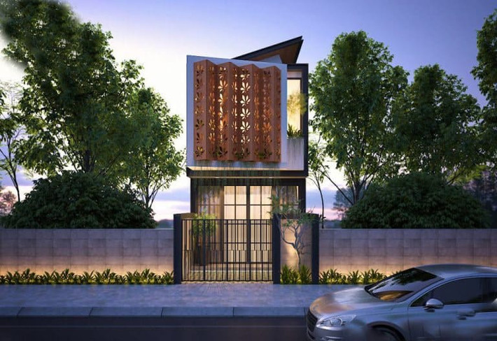 Nhà ống không ban công có thiết kế đẹp mắt, với chi tiết tường hoa gió cách điệu kết hợp với mảng xanh thiên nhiên. Ảnh: Wedo.