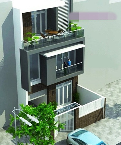 Nhà ống 3 tầng nổi bật với gạch ốp mặt tiền, làm tăng vẻ đẹp sang trọng. Ảnh: Thauxaydungdn.