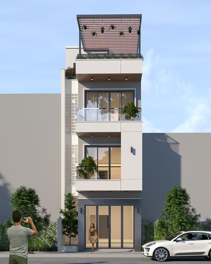 Kiến trúc hiện đại được kiến trúc sư ứng dụng một cách sáng tạo trong việc phân chia bố cục và tạo điểm nhấn cho mặt tiền ngôi nhà 3 tầng. Ảnh: Wedo.