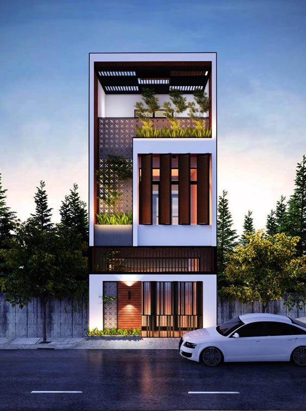 Ứng dụng mảng tường treo xanh một cách độc đáo giúp ngôi nhà gây ấn tượng mạnh ngay từ cái nhìn đầu tiên. Ảnh: Xaynhapho.
