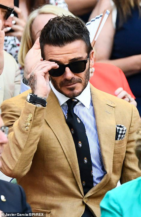 Danh thủ David Beckham tập trung theo dõi trận đấu.