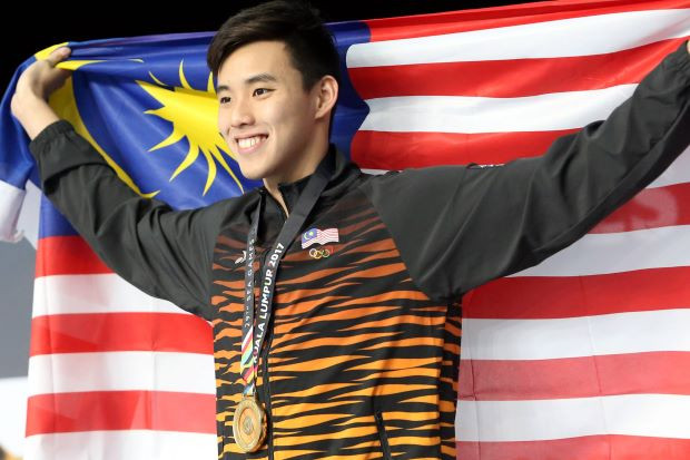 Nụ cười rạng rỡ của kình ngư trẻ Welson khi đăng quang tại SEA Games 29. Ảnh sử dụng trong bài: Facebook nhân vật.