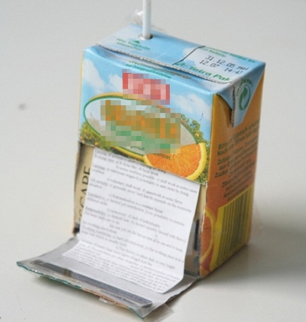 Tỷ mỉ cắt hộp sữa, nơi giấu phao tốt ở đây chứ đâu.