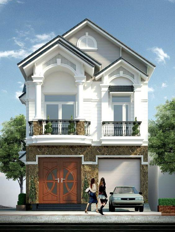 Tuy là nhà ống 2 tầng nhưng mẫu thiết kế này lại khiến người ta gợi nhớ đến các mẫu biệt thự bởi hệ thống mái phụ cùng màu sơn trắng đặc trưng.