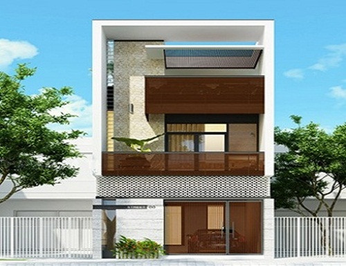 Với khoảng sân nhỏ phía trước phòng khách, gia chủ có thể dùng để đỗ xe, vừa tận dụng trồng cây và làm tiểu cảnh. Ảnh: Camnanglamnha.