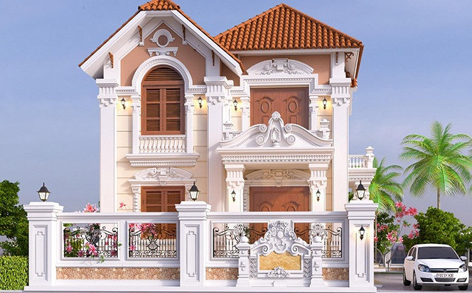 Ngôi biệt thự 2 tầng tân cổ điển nổi bật với các viên ngói xếp chồng và màu sắc bắt mắt. Ảnh: Arcviet.