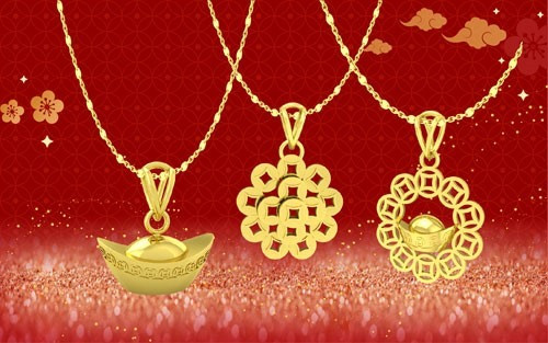 Để đáp ứng nhu cầu của khách hàng, trước ngày Vía Thần Tài, các doanh nghiệp tung ra thị trường nhiều sản phẩm vàng vô cùng độc đáo. Ảnh: Lao động.
