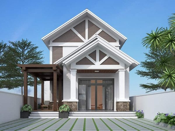 Nhà cấp 4 mái thái có gác lửng kết hợp hài hoà giữa gam màu trắng và màu nâu. Phía trước nhà là khoảng sân rộng rãi. Ảnh: Noithatnhalee