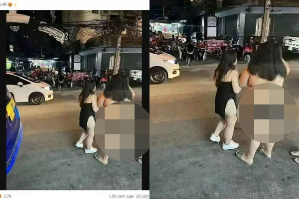 Người bạn đi cùng có phần thon thả, kín đáo hơn trong chiếc váy quây ngực nhưng xẻ tả tới tận eo, để lộ rõ một bên hông.