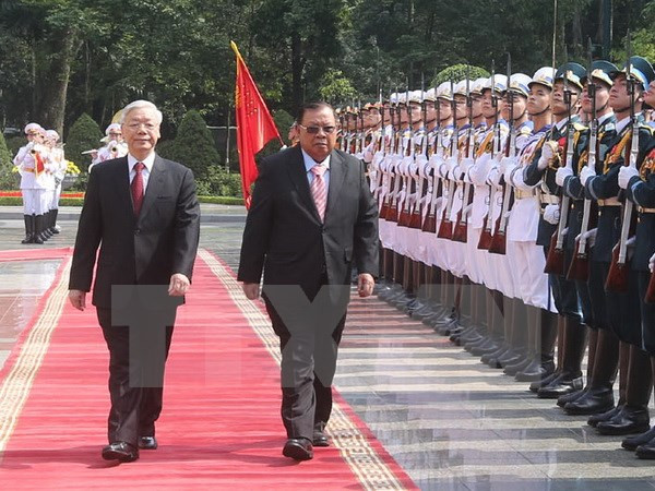 Trong chuyến thăm Việt Nam lần này, Tổng Bí thư, Chủ tịch nước Lào Bounnhang Volachith và các lãnh đạo Việt Nam đã gặp gỡ trao đổi, tái khẳng định thiện chí và nguyện vọng của cả hai phía trong quan hệ hợp tác, tiếp tục phát huy mối quan hệ hữu nghị, tình đoàn kết đặc biệt Lào - Việt Nam có truyền thống từ lâu đời. Ảnh: TTXVN.