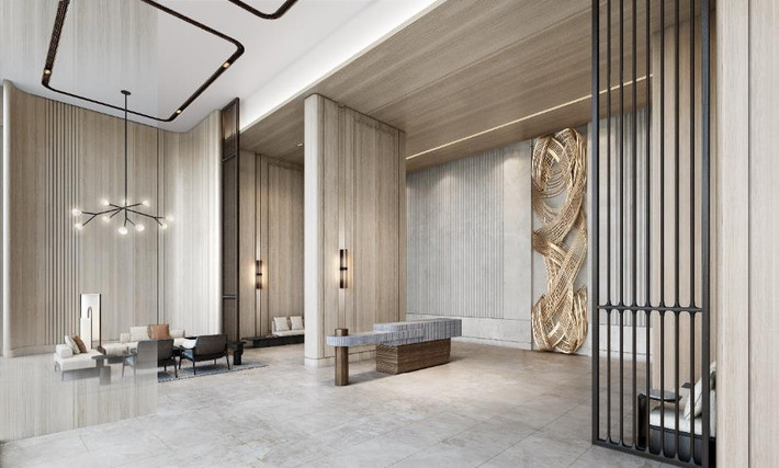 Khu vực sảnh chính tòa nhà được hoàn thiện với đá marble, gỗ cao cấp ốp tường và trang trí. Ảnh: Facebook