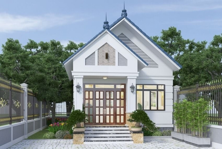 Ngôi nhà có ngoại thất đơn giản với cách bố trí sân vườn khép kín. Ảnh: Wedo