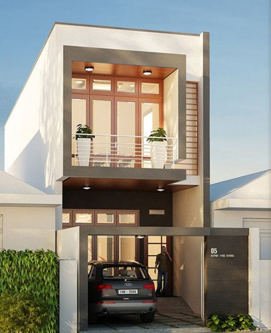 Nhà ống mái bằng hiện đại với ánh đèn sáng rực rỡ. Ảnh: Nhabinhduong.