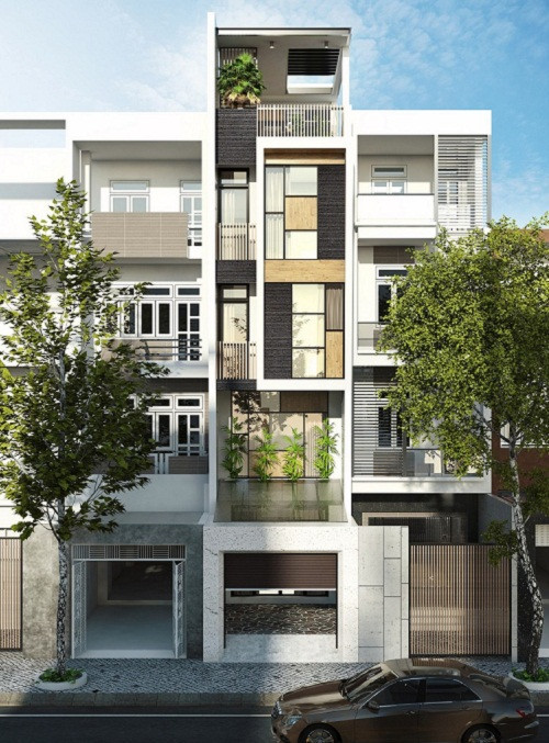 Nét đẹp của nhà phố 4 tầng thể hiện ở những nét phá cách về hình khối, cấu trúc bất đối xứng tinh tế. Ảnh: Tda.
