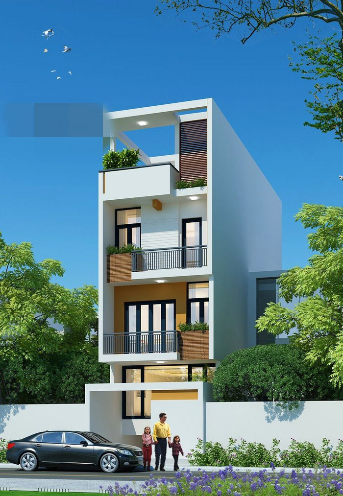 Mẫu nhà phố kết hợp kinh doanh được trang trí đá ốp trải dài từ cổng vào cửa chính. Ảnh: Arhome.