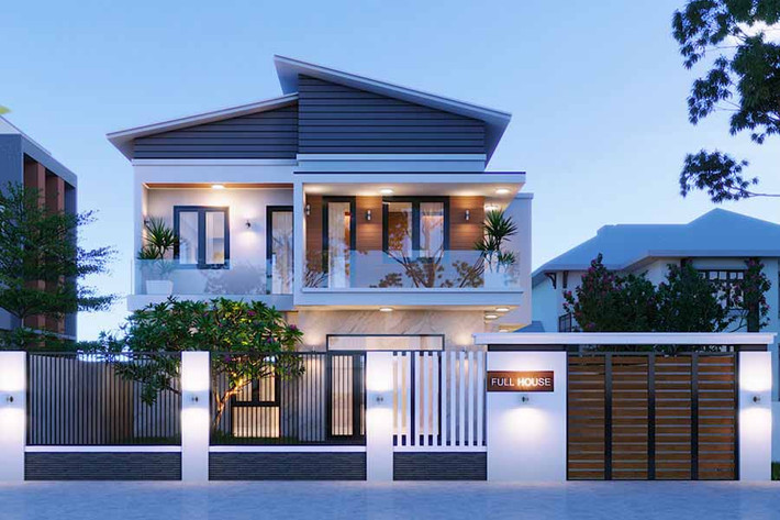 Nhà 2 tầng có sự kết hợp giữa các chất liệu bê tông, đá, gỗ và kính. Ảnh: Noithatduongdai.