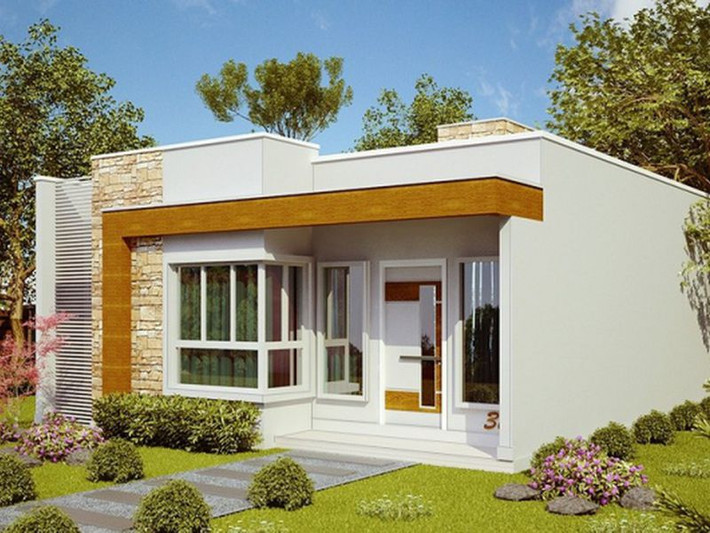 Nhà mái bằng hiện đại sở hữu kiến trúc ngoại thất trẻ trung với sự kết hợp màu sắc ở mặt tiền hài hòa, tạo hình có điểm nhấn kết hợp chất liệu kính, gỗ công nghiệp. Ảnh: Angcovat.