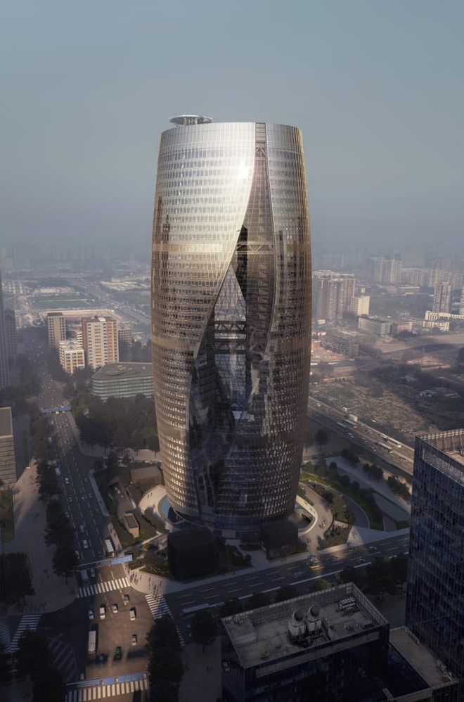 Tòa tháp bằng kính Leeza SOHO tại Bắc Kinh (Trung Quốc) sở hữu khoảng thông tầng cao nhất thế giới (gần 190m) - ngang với độ cao của toàn công trình. Nguồn ảnh: CNN, Dezeen.