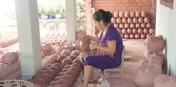 Các mẫu mã, kiểu dáng về heo được thực hiện phong phú hơn. Ảnh: TTXVN.