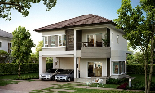 Mái ngói nâu sẫm kết hợp cùng những màu sắc dịu nhẹ của 4 mặt tường giúp ngôi nhà có vẻ ngoài thân thiện giữa khung cảnh sân vườn xanh mát. Ảnh: Kientrucboba.