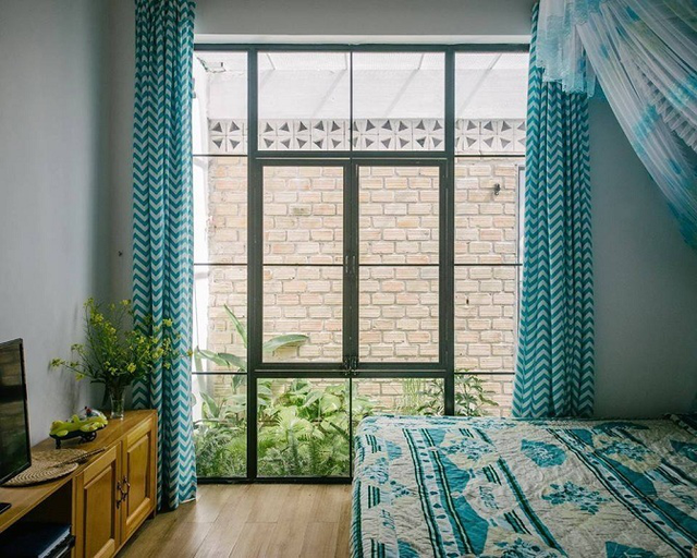 Phòng ngủ thoáng mát với gam màu nhẹ nhàng.