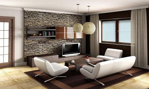 Giữa gam màu trắng tinh tế của phòng khách nổi lên bức tường nhỏ hình chữ nhật với những viên đá tối màu lạ mắt mà sang trọng.