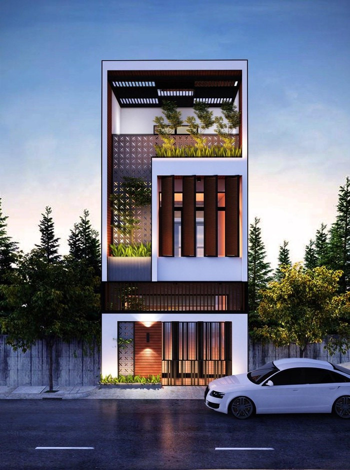  Nhà ống 3 tầng thiết kế lạ mắt khi mặt tiền loại bỏ hoàn toàn các chi tiết trang trí cầu kì, rườm rà của trường phái cổ điển, tân cổ điển. Ảnh: Sateccons.