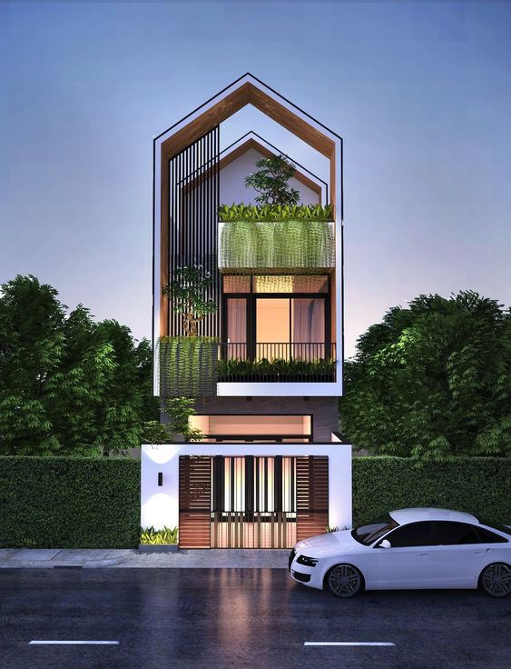 Nét độc đáo của ngôi nhà đến từ các thanh chắn song song nhỏ nhắn và phần hở trên mái có thể trồng cây. Ảnh: Xaydungso.