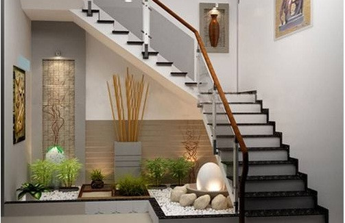 Cầu thang kính cường lực có ưu điểm không bị hoen gỉ, mối mọt, thường áp dụng cho nhà phố diện tích nhỏ. Ảnh: Thietkenhadepmoi.