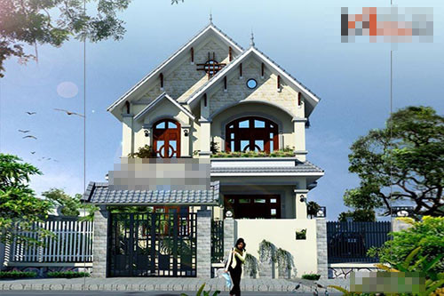 Nhà 2 tầng được thiết kế đơn giản, mái ngói dốc, xung quanh là cây xanh thoáng mát. Ảnh: Vinavic.
