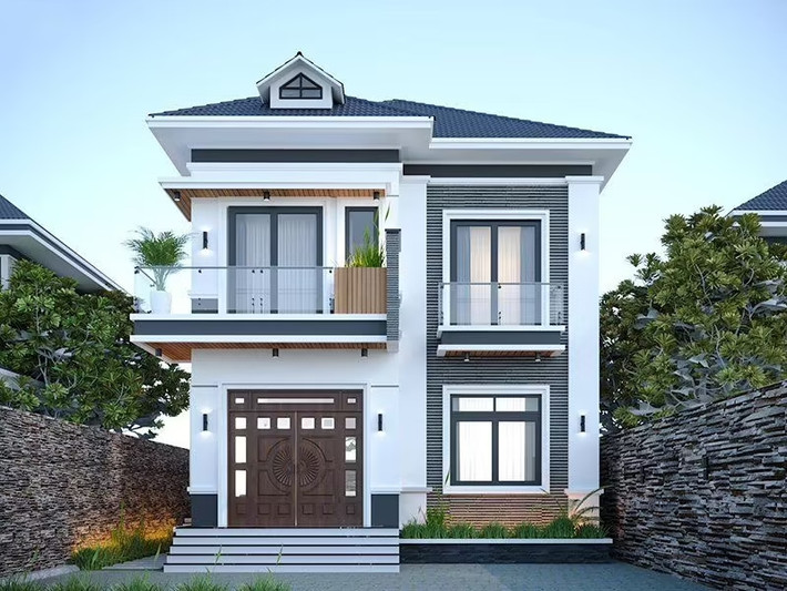 Mẫu nhà mái Nhật 2 tầng thiết kế đơn giản nhưng vẫn ấn tượng bởi màu sơn trắng phối xanh đẹp hút mắt. Ảnh: Xaynhdeponline