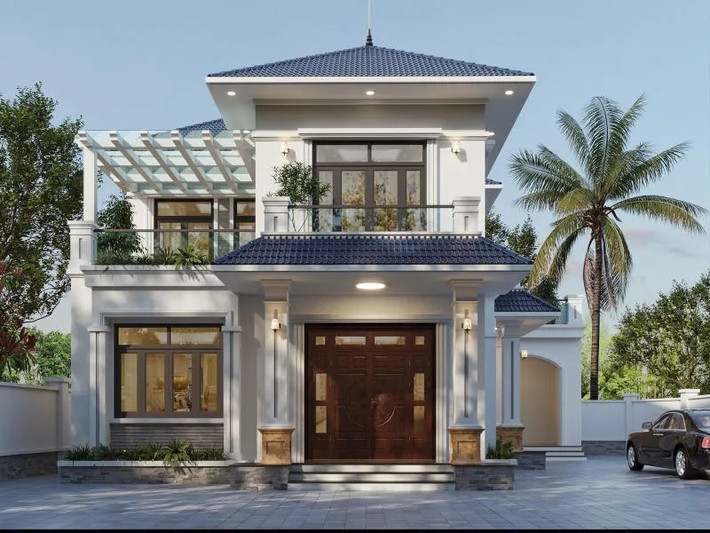 Mẫu nhà mái Nhật 2 tầng hiện đại sở hữu hình khối vuông vức, đường nét khỏe khoắn. Phần mái có độ dốc vừa phải, giúp thoát nước nhanh chóng và chống thấm hiệu quả. Ảnh: Spacet